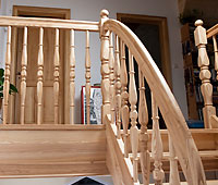 Openwork stringer stairs with the bend at the entrance and with the winding ENERGY solutions