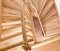 Openwork stringer stairs with the bend at the entrance and with the winding ENERGY solutions